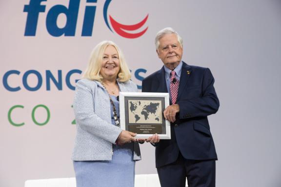 FDI President Dr Kathryn Kell and former Executive Director Dr John Clarkson